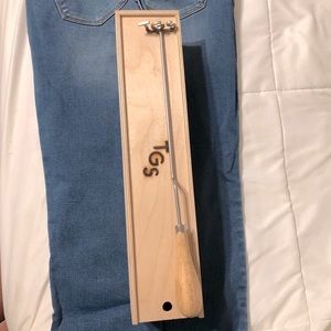 Steak branding iron in wooden box with initials “T G S”